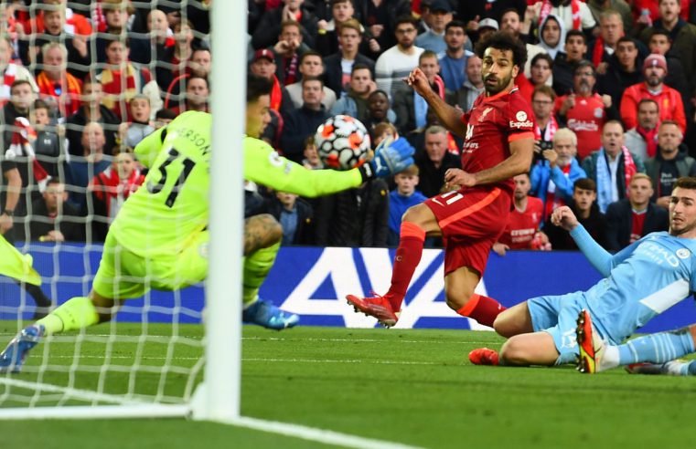 Liverpool 2-2 Man City: Mohamed Salah scores stunning goal as Premier League title rivals go toe to toe at Anfield