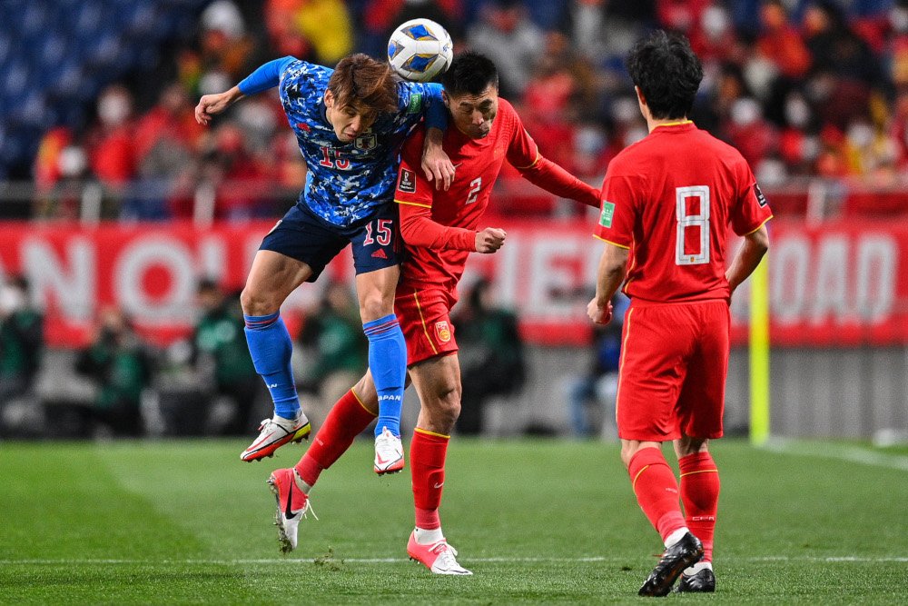 Japan beat toothless China to take step closer to World Cup