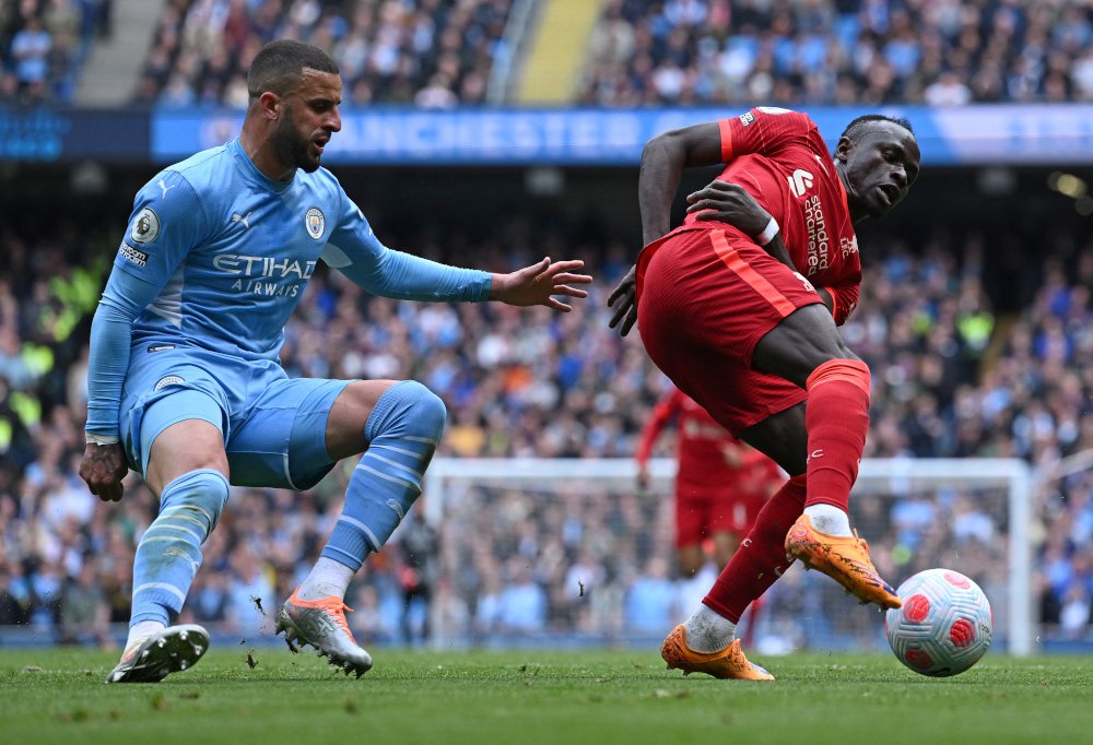 Man City, Liverpool locked in title battle as Arsenal eye top four bid